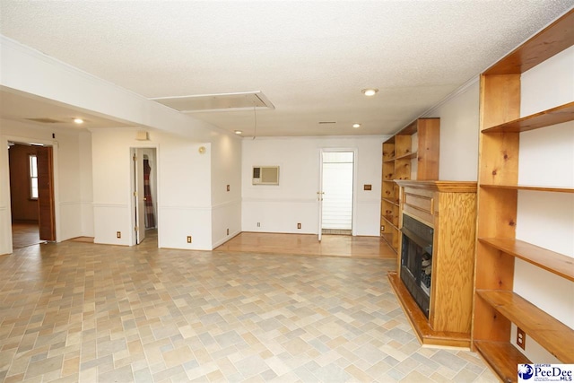 unfurnished living room featuring a textured ceiling