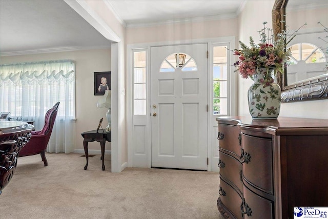 2338 W Mccown Dr, Florence, SC 29501 - entrance foyer with light colored carpet, ornamental molding, and baseboards