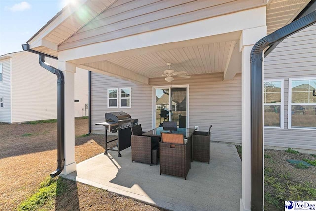 view of patio / terrace with a ceiling fan, outdoor dining area, and a grill