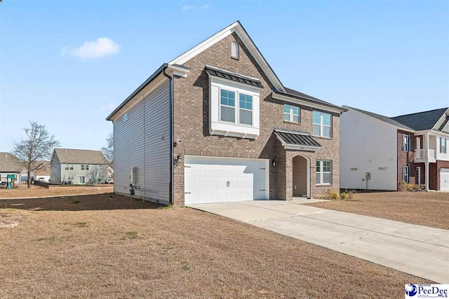 view of front facade with driveway, brick siding, a front lawn, and an attached garage