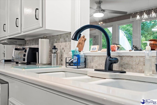 3844 W Lake Dr, Florence, SC 29501 - detailed view of decorative backsplash and ceiling fan