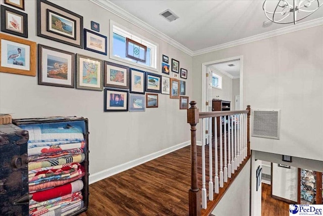 3844 W Lake Dr, Florence, SC 29501 - hallway with an upstairs landing, wood finished floors, ornamental molding, and a chandelier