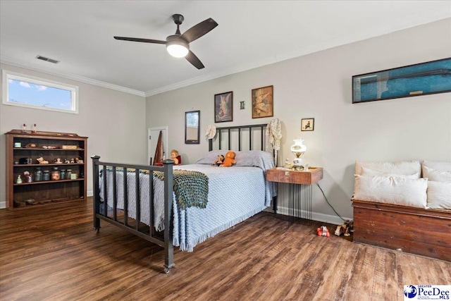 3844 W Lake Dr, Florence, SC 29501 - bedroom with wood finished floors, crown molding, and ceiling fan