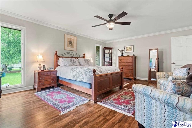 3844 W Lake Dr, Florence, SC 29501 - bedroom with wood finished floors, ornamental molding, and ceiling fan