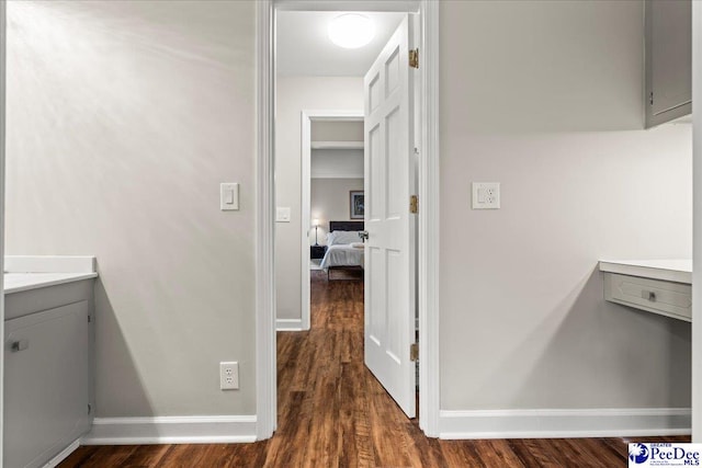 3844 W Lake Dr, Florence, SC 29501 - corridor with dark wood-style floors and baseboards
