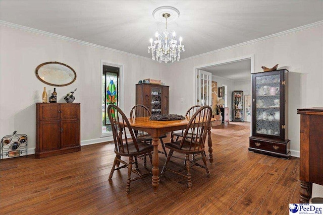 3844 W Lake Dr, Florence, SC 29501 - dining area with a chandelier, wood finished floors, and ornamental molding