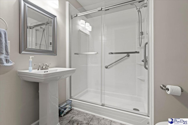 3844 W Lake Dr, Florence, SC 29501 - bathroom featuring a shower stall and a sink
