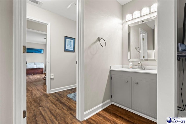 3844 W Lake Dr, Florence, SC 29501 - bathroom featuring vanity and wood finished floors