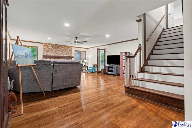 3844 W Lake Dr, Florence, SC 29501 - living area featuring a ceiling fan, ornamental molding, wood finished floors, stairway, and recessed lighting