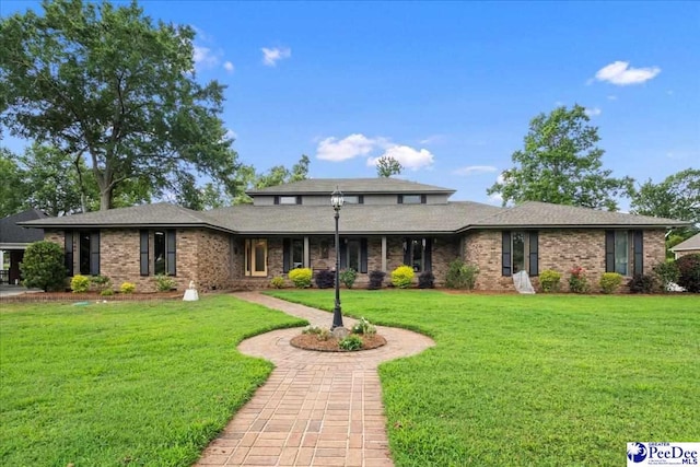 3844 W Lake Dr, Florence, SC 29501 - view of front of property featuring a front yard and brick siding