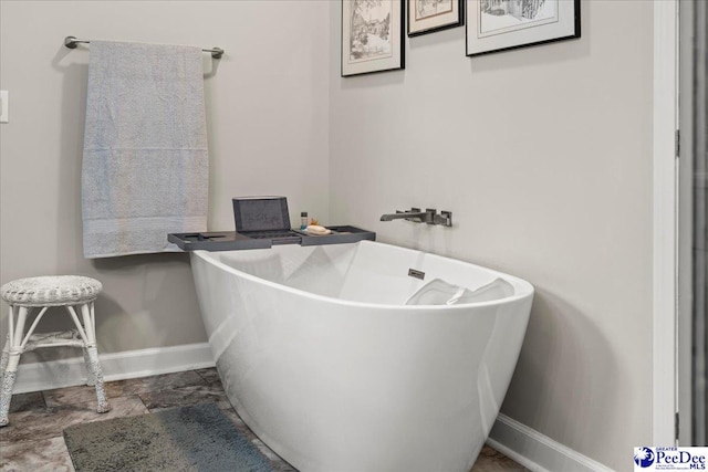 3844 W Lake Dr, Florence, SC 29501 - bathroom featuring a freestanding tub
