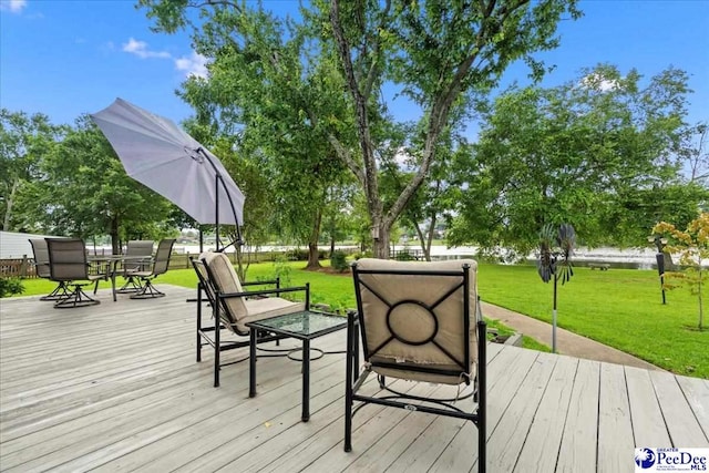 3844 W Lake Dr, Florence, SC 29501 - wooden deck with a yard