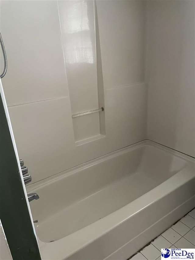 108 Swails St, Kingstree, SC 29556 - bathroom with tile patterned floors and shower / bathtub combination