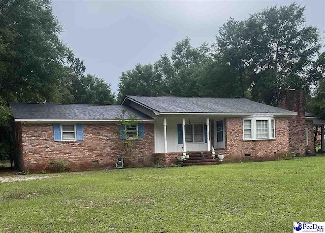 108 Swails St, Kingstree, SC 29556 - single story home with crawl space, covered porch, a front lawn, brick siding, and a shingled roof