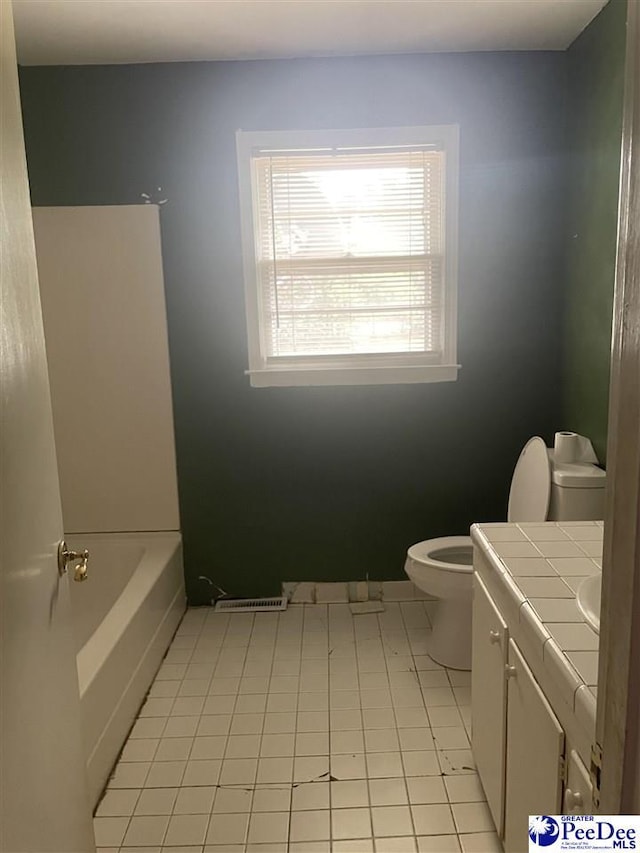 108 Swails St, Kingstree, SC 29556 - full bathroom with toilet, vanity, tile patterned flooring, and baseboards