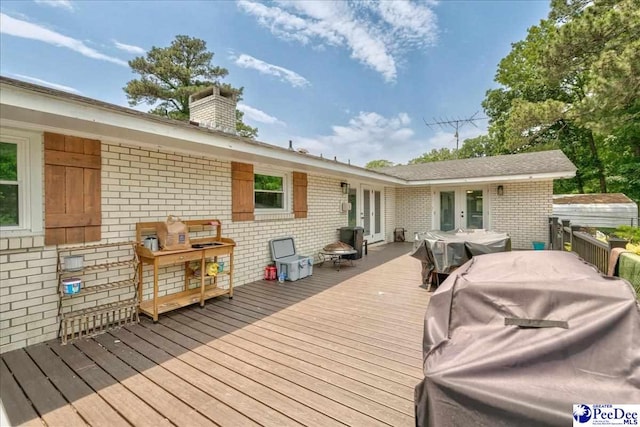 133 Peacock Row, Lamar, SC 29069 - wooden terrace featuring french doors, grilling area, and outdoor dining area