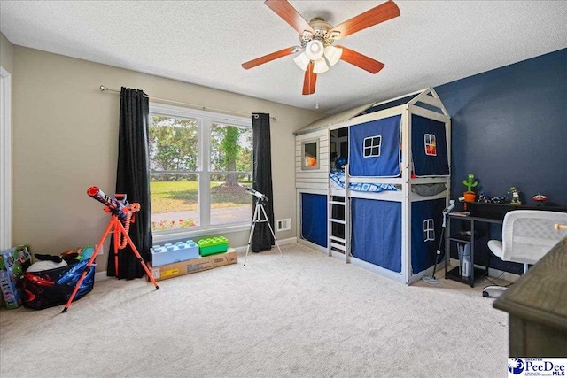133 Peacock Row, Lamar, SC 29069 - carpeted bedroom with a textured ceiling and ceiling fan