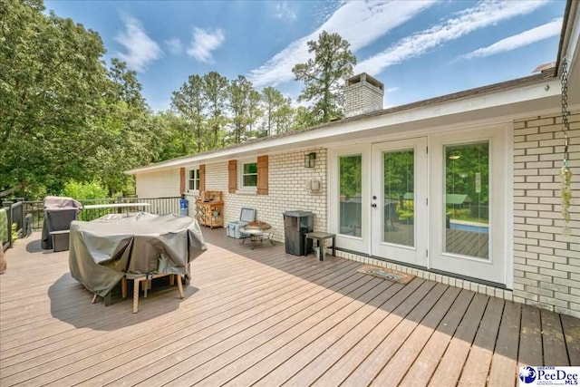 133 Peacock Row, Lamar, SC 29069 - wooden deck featuring outdoor dining space and french doors