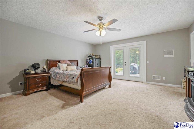 133 Peacock Row, Lamar, SC 29069 - carpeted bedroom with access to exterior, french doors, baseboards, a textured ceiling, and a ceiling fan