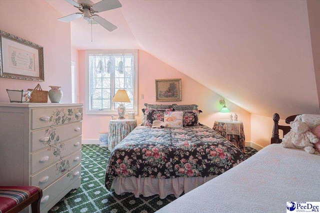 bedroom featuring ceiling fan and vaulted ceiling