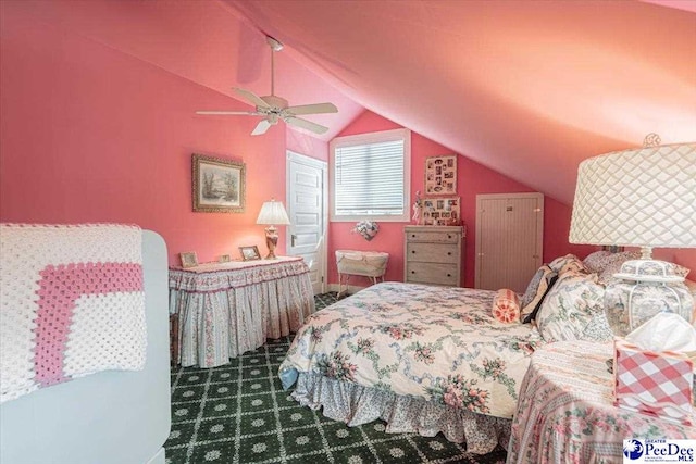 carpeted bedroom with lofted ceiling and ceiling fan