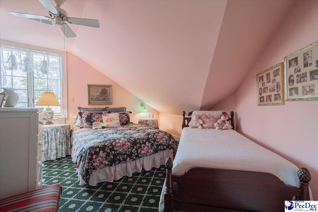 bedroom featuring lofted ceiling, ceiling fan, and carpet