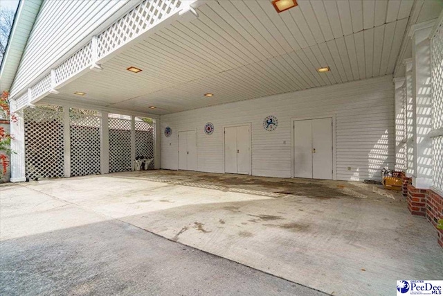 garage with a carport