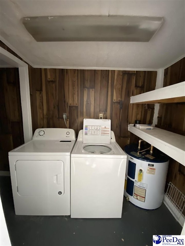 202 S Warley St, Darlington, SC 29532 - washroom featuring washing machine and dryer, water heater, and wood walls