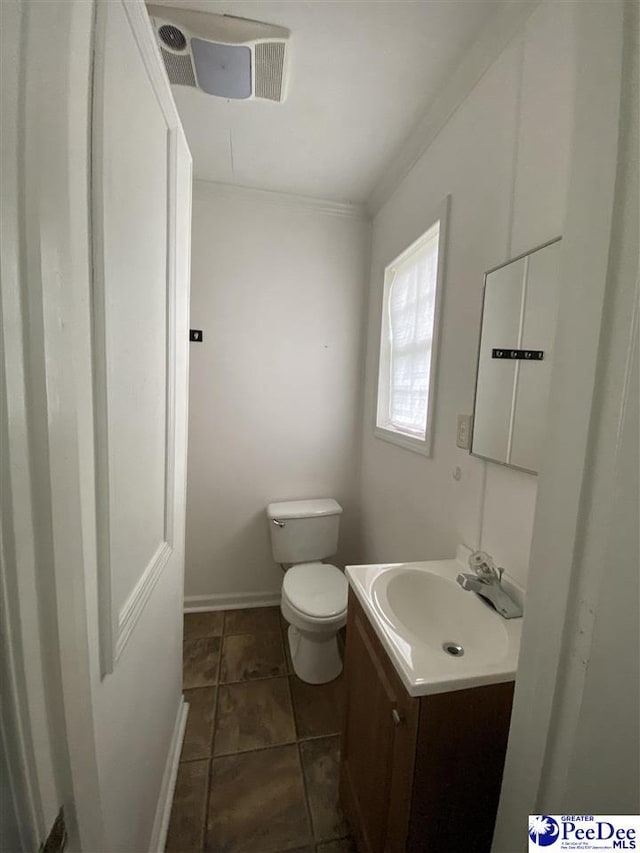 202 S Warley St, Darlington, SC 29532 - bathroom with vanity, toilet, ornamental molding, baseboards, and electric panel
