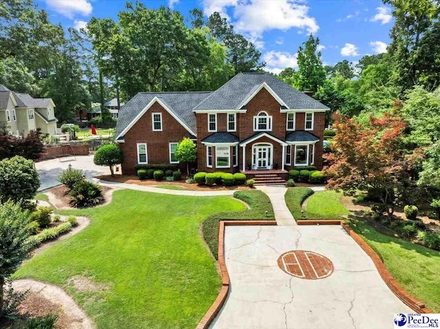 3402 Sussex Ct, Florence, SC 29501 - view of front of home with a front yard and brick siding