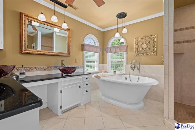 3402 Sussex Ct, Florence, SC 29501 - full bathroom featuring vanity, a freestanding tub, ornamental molding, tile patterned floors, and tile walls