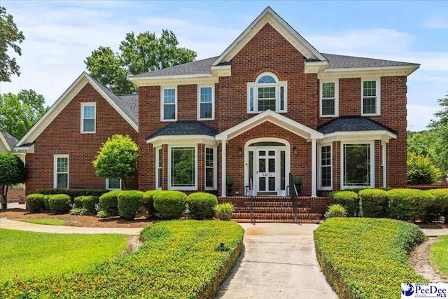 3402 Sussex Ct, Florence, SC 29501 - view of front of home featuring brick siding and roof with shingles