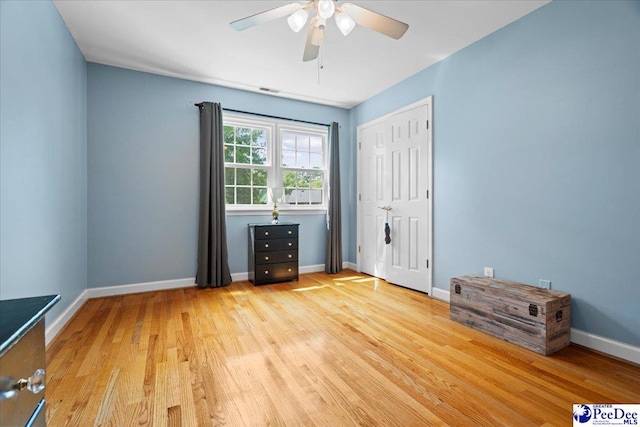3402 Sussex Ct, Florence, SC 29501 - unfurnished bedroom with light wood-style floors, a closet, and ceiling fan