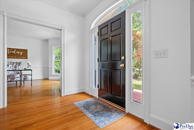 3402 Sussex Ct, Florence, SC 29501 - entryway with ornamental molding and light wood-style floors