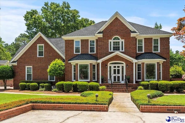 3402 Sussex Ct, Florence, SC 29501 - view of front of house featuring brick siding and a shingled roof