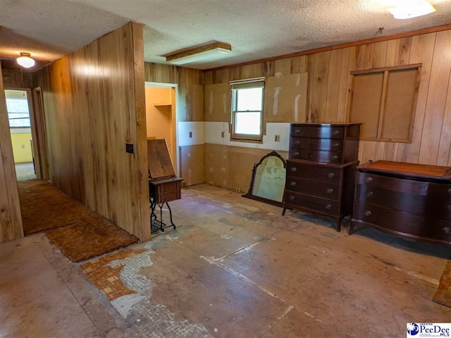 2305 Sandra Cir, Palmplico, SC 29583 - kitchen with a textured ceiling and wood walls