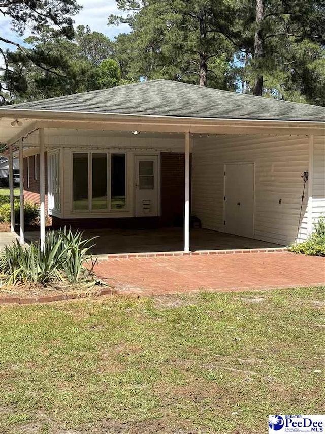 111 Brittain Rd, Darlington, SC 29532 - view of front of home featuring roof with shingles and a front yard
