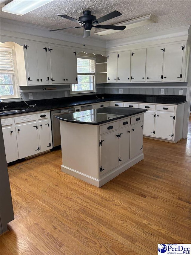 111 Brittain Rd, Darlington, SC 29532 - kitchen featuring dishwasher, a textured ceiling, dark countertops, white cabinetry, and ceiling fan