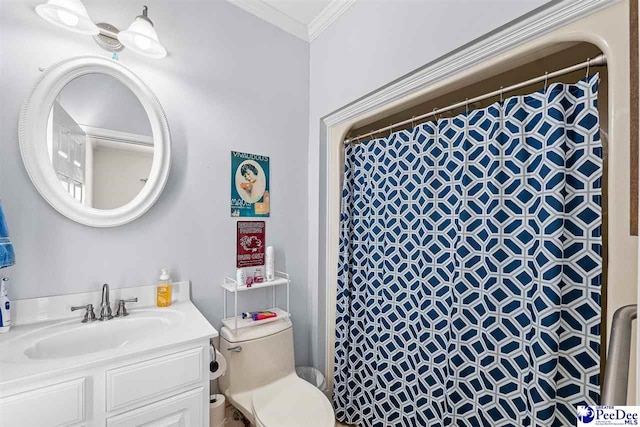 bathroom featuring toilet, vanity, crown molding, and a shower with shower curtain