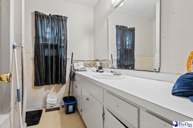 517 Alane St, Lake City, SC 29560 - full bathroom with vanity and a textured ceiling