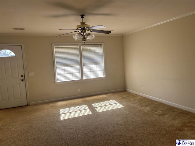 1611 S Lee Dr, Florence, SC 29501 - carpeted entryway featuring baseboards, visible vents, crown molding, and a ceiling fan