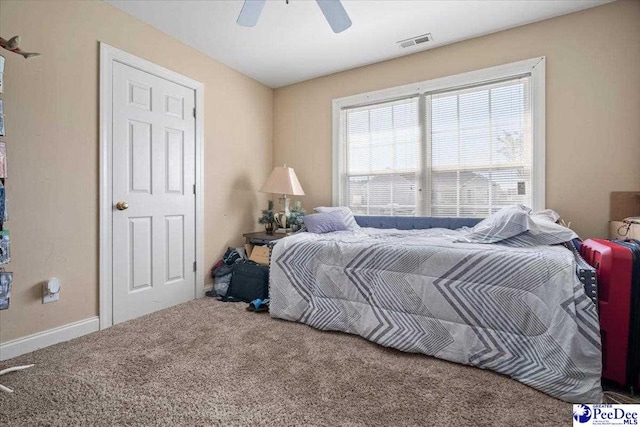 carpeted bedroom featuring ceiling fan