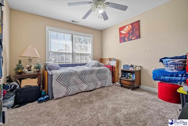 carpeted bedroom featuring ceiling fan