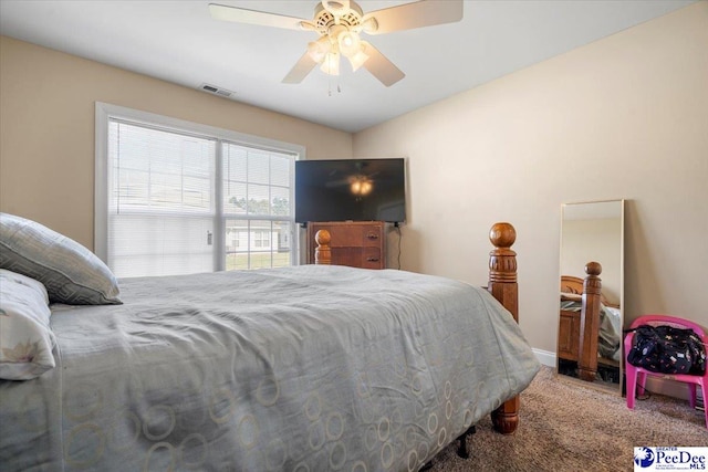 carpeted bedroom featuring ceiling fan