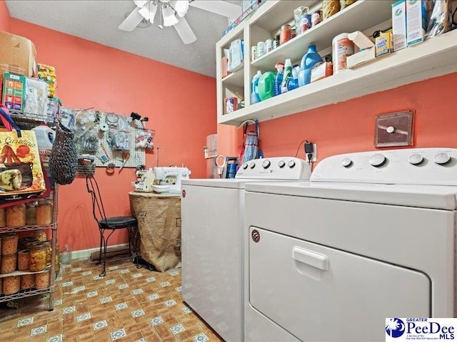 laundry room featuring ceiling fan and washer and dryer