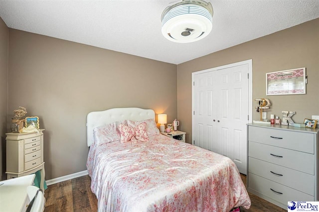 912 Ivanhoe Dr, Florence, SC 29505 - bedroom with dark wood-type flooring and a closet