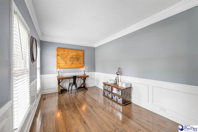 912 Ivanhoe Dr, Florence, SC 29505 - office space with a textured ceiling, wood finished floors, crown molding, and wainscoting