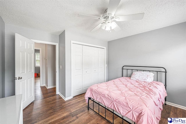 912 Ivanhoe Dr, Florence, SC 29505 - bedroom featuring wood finished floors, a textured ceiling, a closet, and a ceiling fan