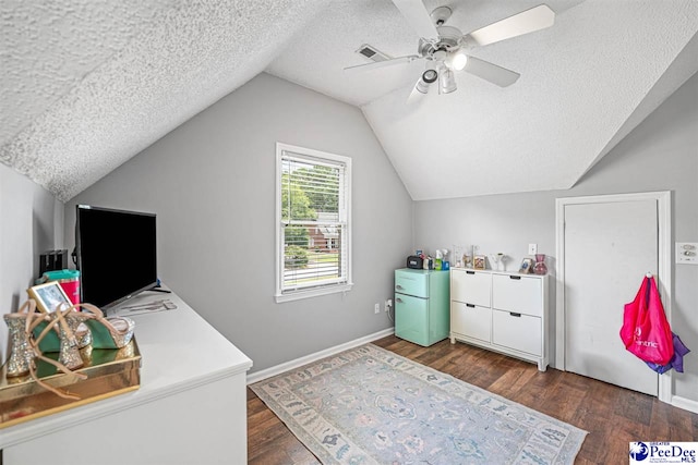 912 Ivanhoe Dr, Florence, SC 29505 - office featuring a textured ceiling, dark wood finished floors, lofted ceiling, and ceiling fan