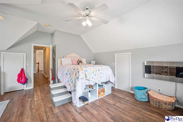 912 Ivanhoe Dr, Florence, SC 29505 - bedroom with wood finished floors, lofted ceiling, ceiling fan, and a textured ceiling